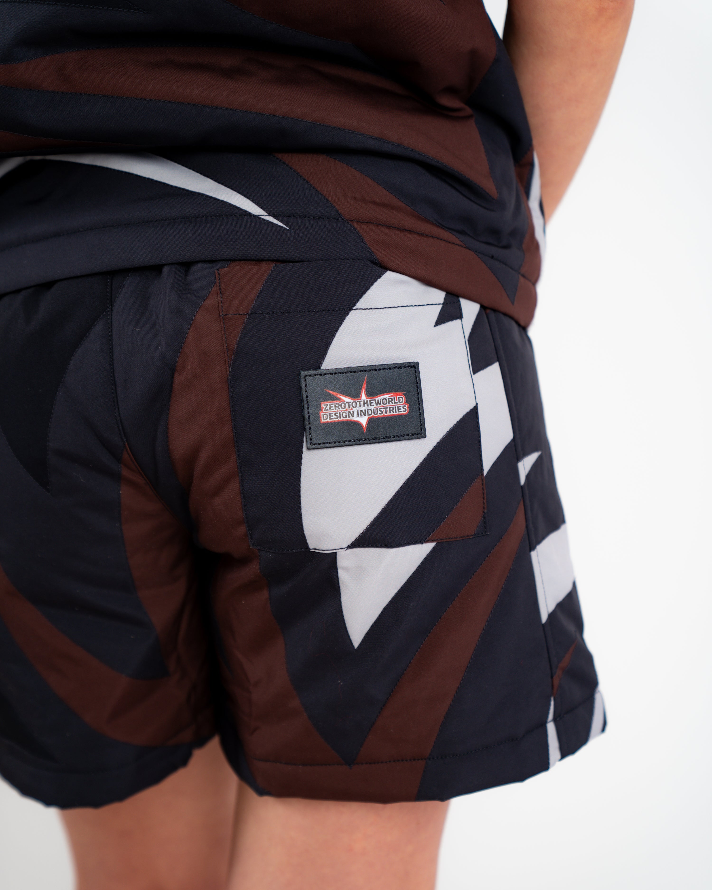 Black camo puffer shorts