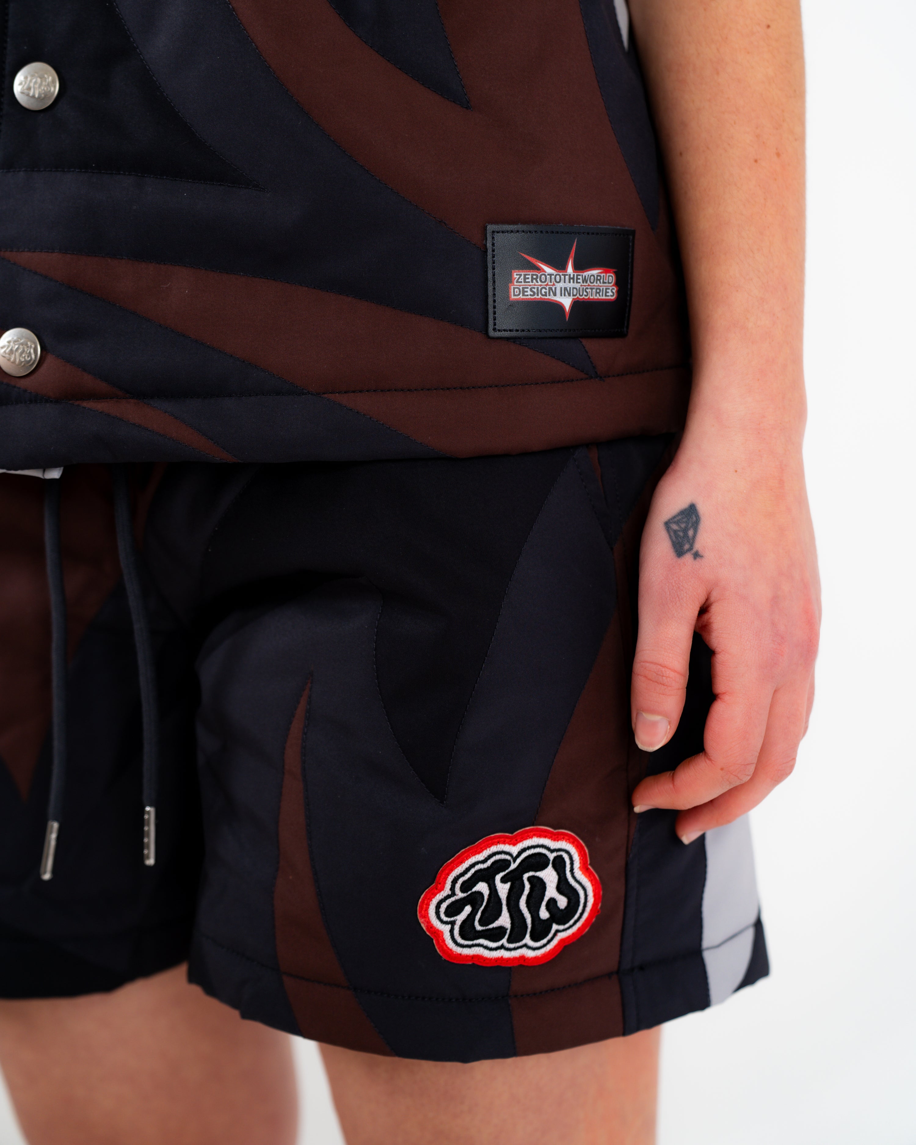 Black camo puffer shorts